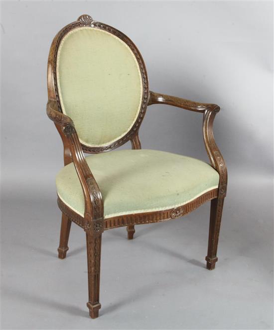 A set of sixteen Hepplewhite design mahogany elbow chairs, W.2ft 3in. H.3ft 2in.